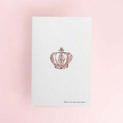 Card with a decorative crown design with 'today you wear the crown' written at the bottom of the greeting card