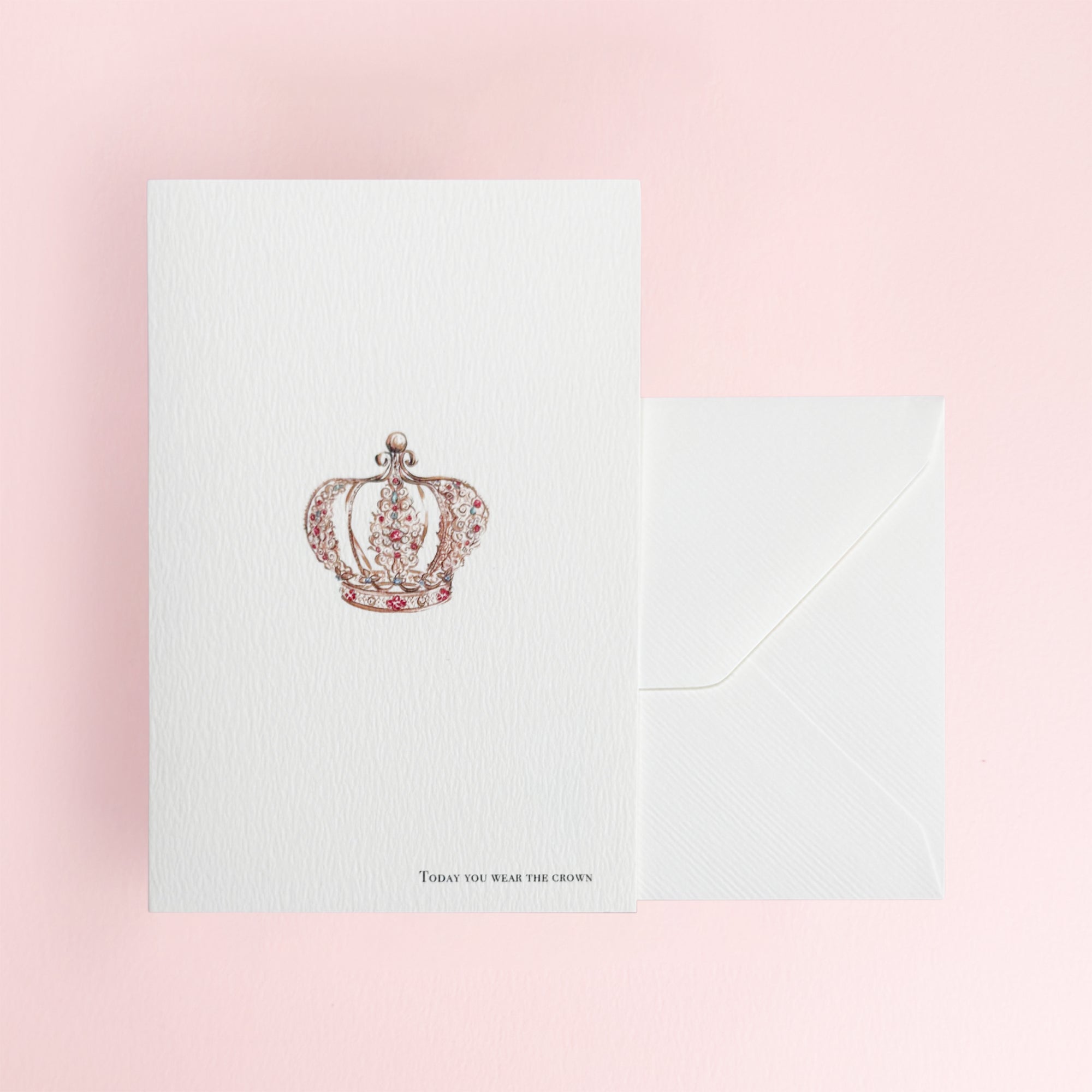 Card with a decorative crown design with 'today you wear the crown' written at the bottom of the greeting card