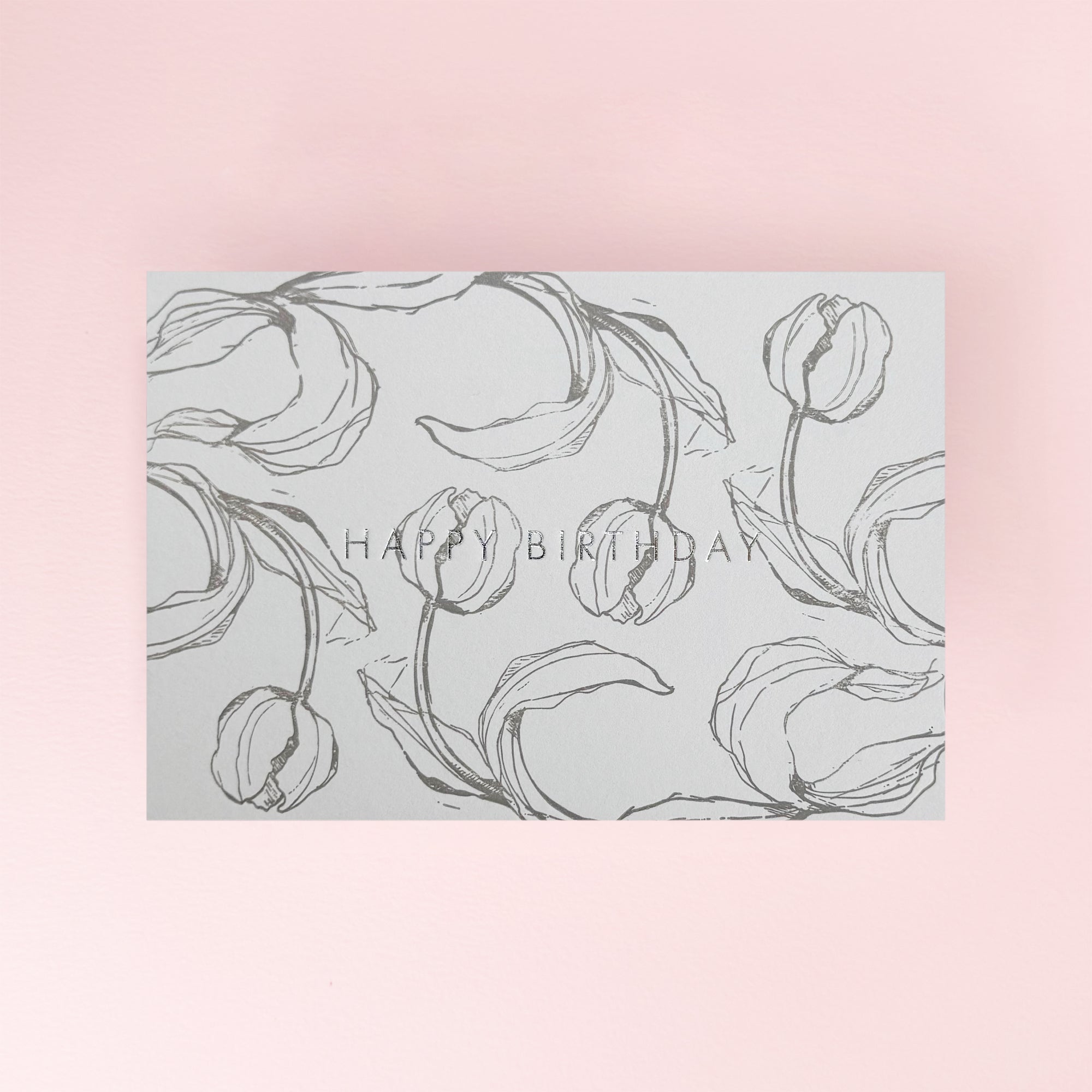 Greeting card with tulip design and 'Happy Birthday' text
