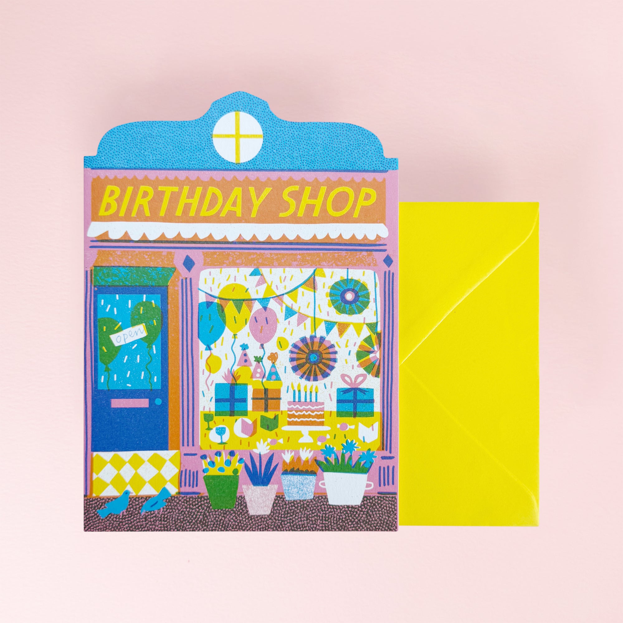 Illustration of a birthday shop with colorful decorations on a pink background